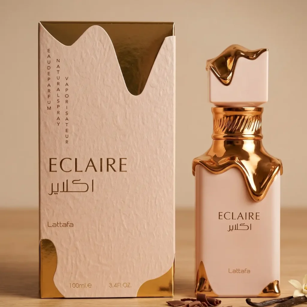 Lattafa Eclaire perfume bottle and box with caramel vanilla gourmand design on beige background